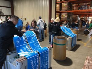 wrapping food donation barrels