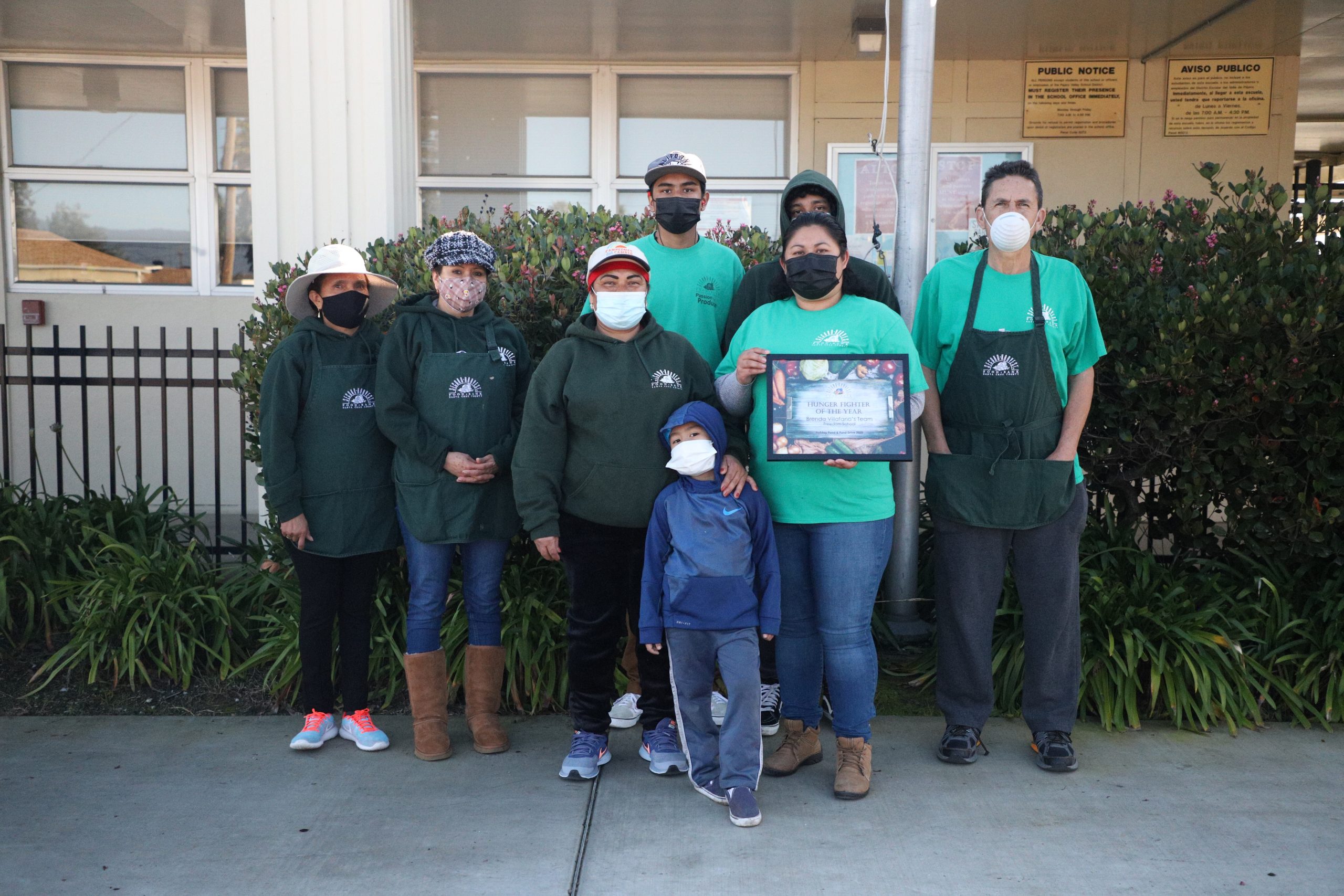 Volunteers with masks during pandemic