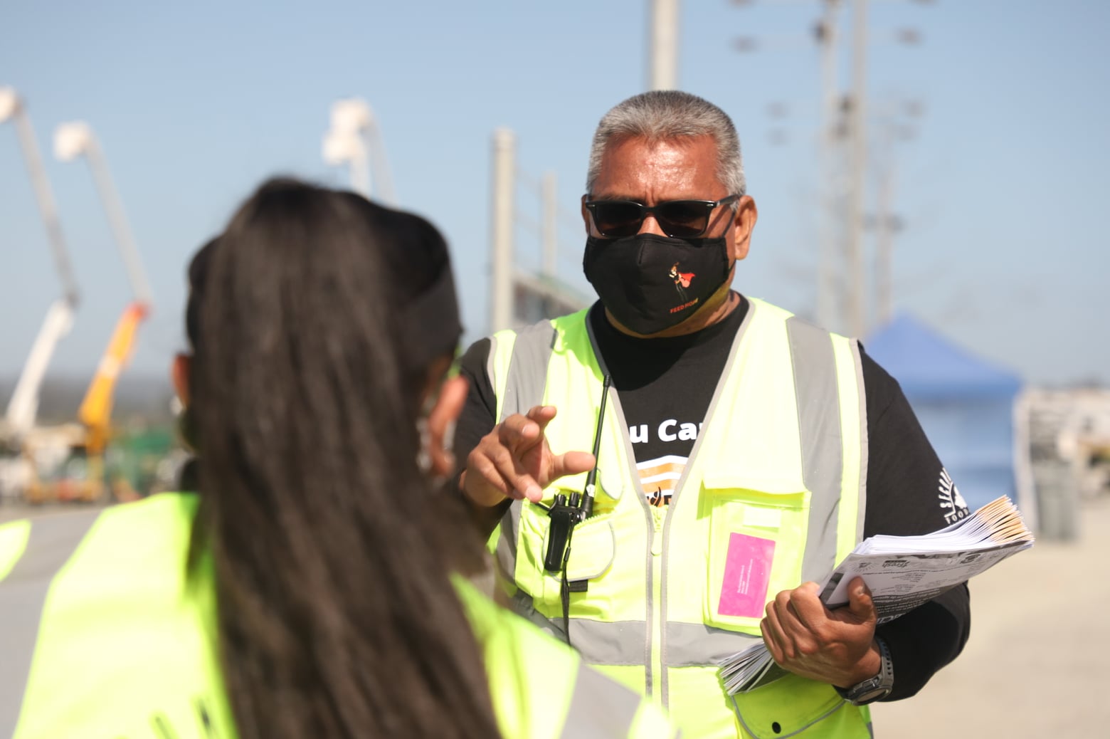 Joel Campos in mask at mass distribution center