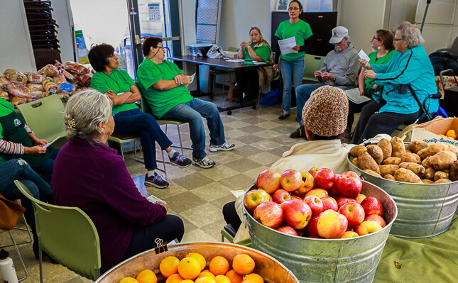 Nutrition class with buckets of fresh foods