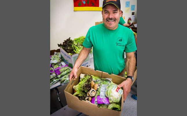 Man with box of food