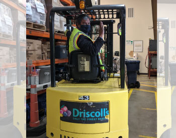 Second Harvest Forklift driver waving