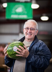 Man holding a watermelon